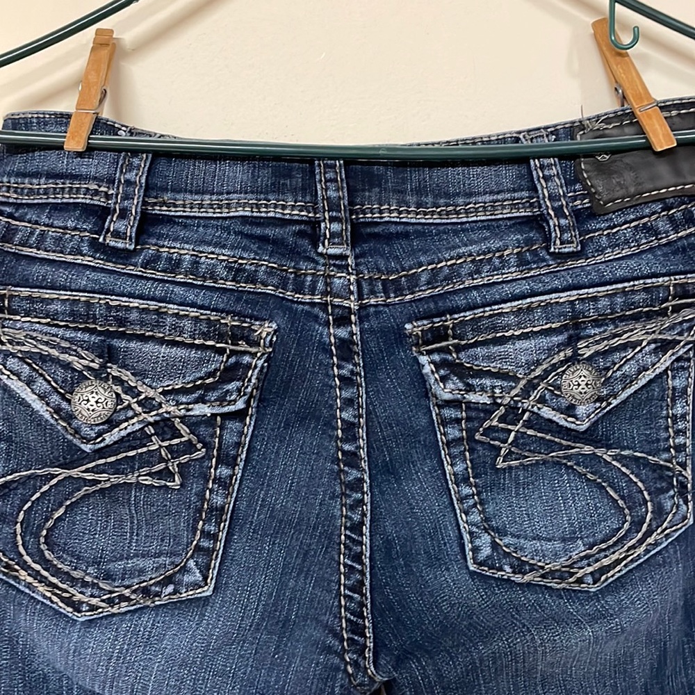 Silver Suki Buckle Jeans, size 31, length is 30 due to hemming